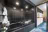 Full bathroom featuring a whirlpool tub