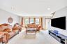Living room with carpet flooring and recessed lighting