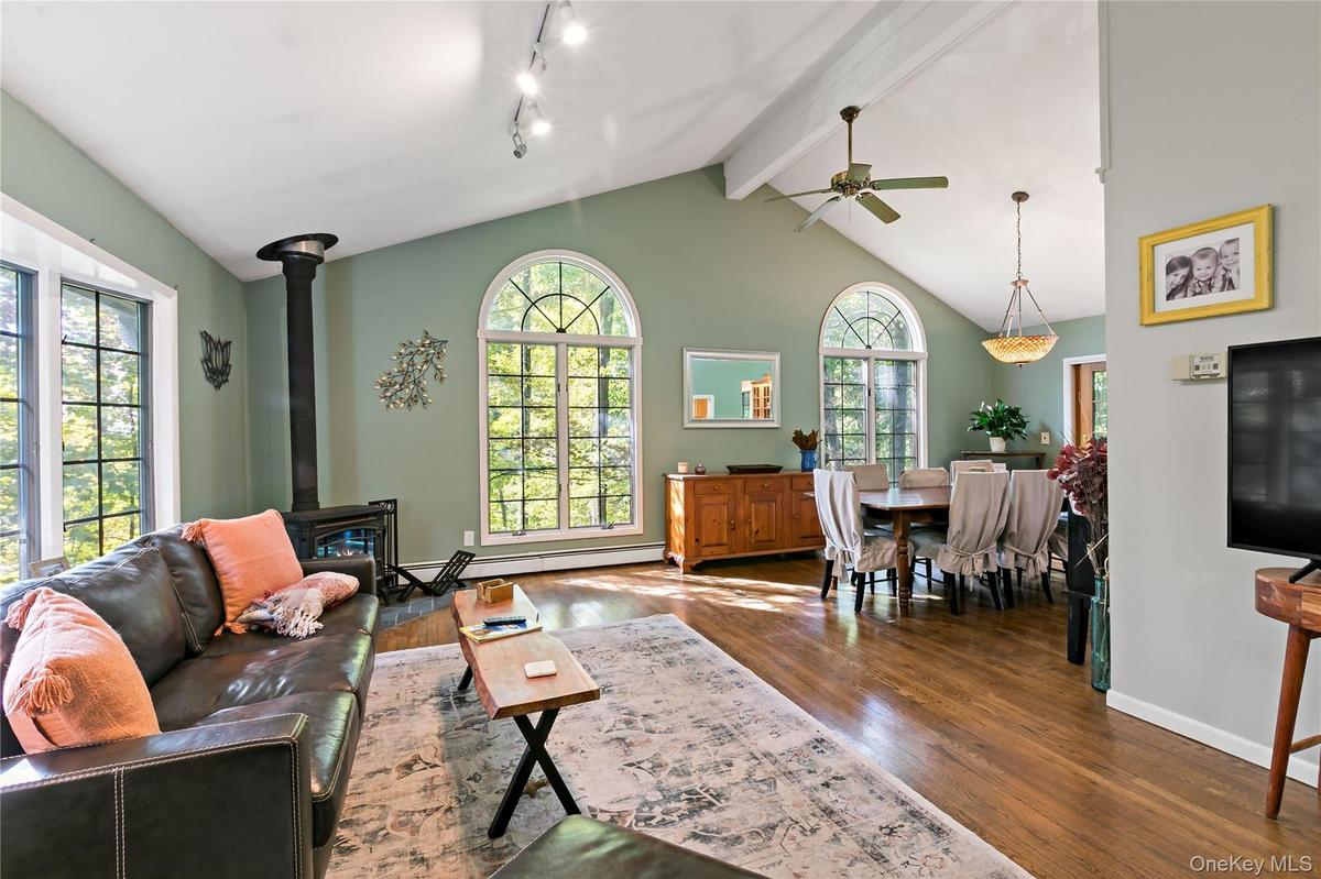 Elegant windows overlooking the woods. Tree house anybody?