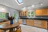 Eat in kitchen with pass through to the dining room. Rich luxurious counters.