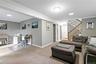 Photo showing doors to the laundry room, two car garage, and potential fourth bedroom.