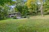 Long gracious driveway leads to the home.
