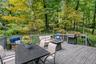 Lush wooded setting for the private deck.
