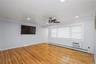 First floor living room with hardwood floors.