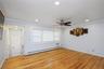 First floor living room with hardwood floors.