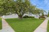 Corner property with plenty of yard space in the front, side and back.
