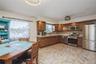 Second floor large kitchen with new stainless steel appliances and huge pantry room.