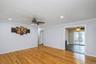 First floor living room with hardwood floors.
