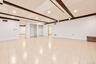 Lower level family room. Vinyl tile floor, large closets, door to large mudroom and garage.