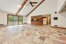 Sliding glass doors to new deck, open to kitchen, cathedral ceiling