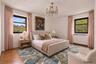 Master bedroom staged with queen sized bed