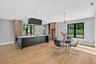 Dining area with light wood-style flooring, a chandelier, and recessed lighting