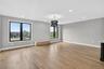 Unfurnished living room featuring light wood-type flooring and recessed lighting