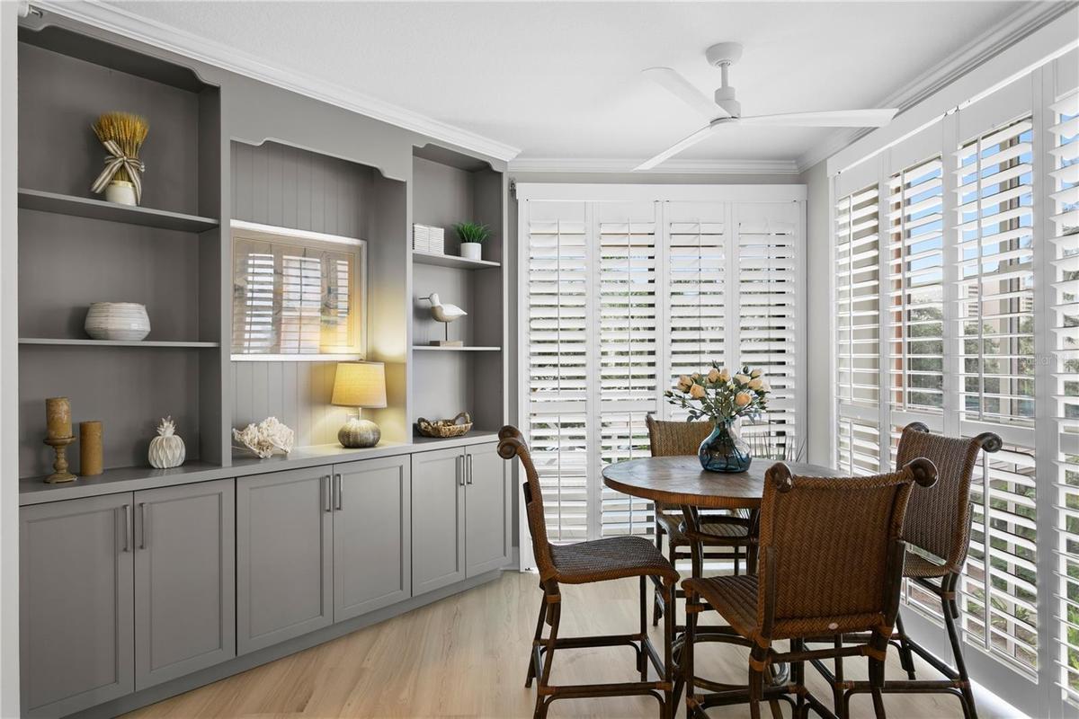 Casual Dining Area with Entertainment Center and Access to South Veranda