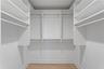 Custom Walk-In CLoset  (1 of 2 closets ) in Primary