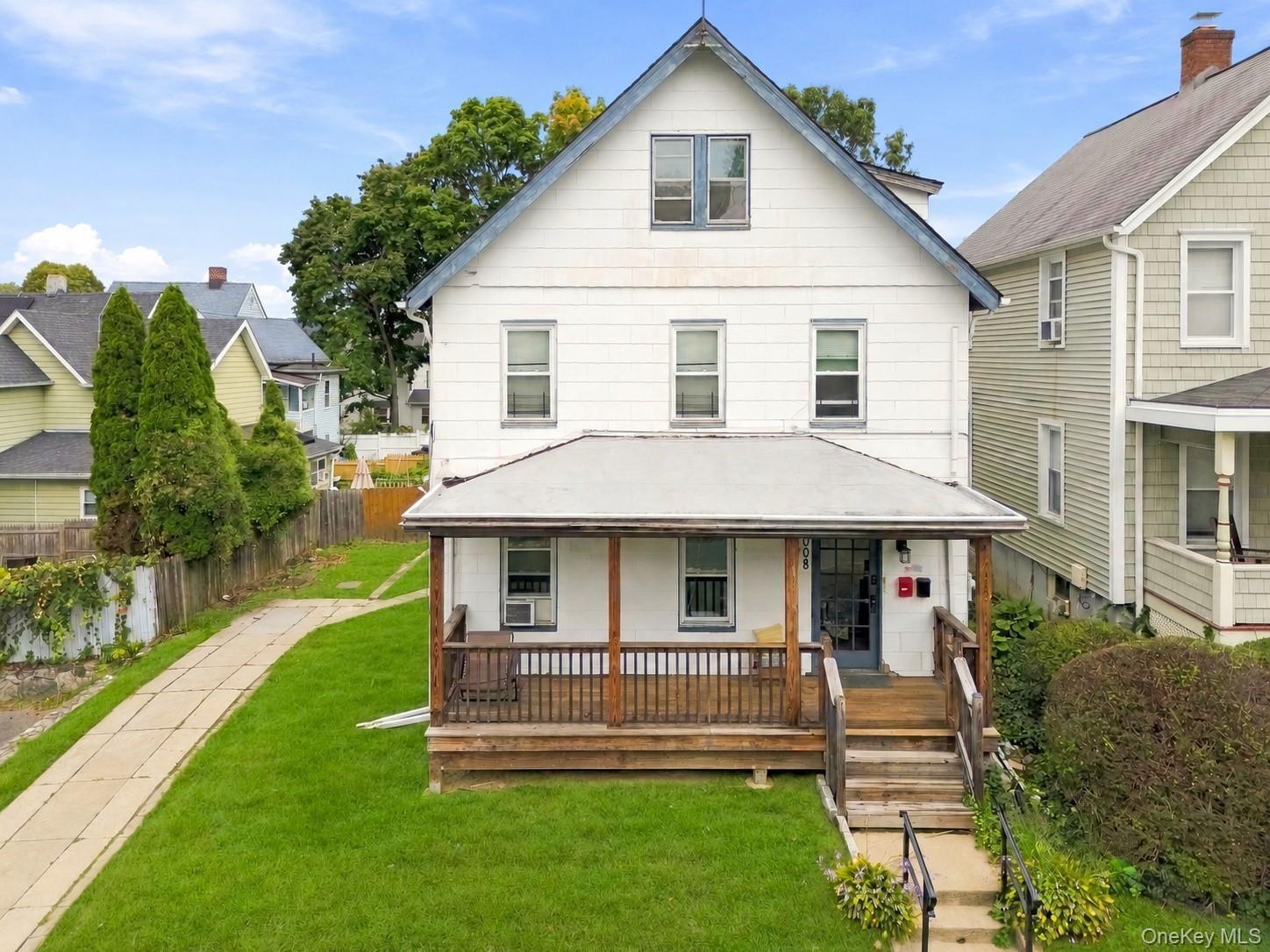 Front porch duplex colonial with fantastic walkability!