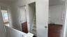 Hallway and staircase to attic