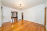 Formal Dining Room with a view into the Formal Living Room. Freshly painted throughout and all new light fixtures.
