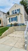 Front of the house including parking spot