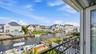 En suite bedroom, French doors open to this stunning water view