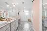 It's a Vibe! Your Primary Bathroom includes a Double Vanity, a Custom Built Walk In Closet and a Double Shower of Epic Proportions!
