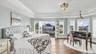 Primary en suite bedroom overlooking stunning water views.