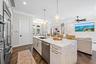 Enjoy an open Kitchen to Living Space with a view of everything!