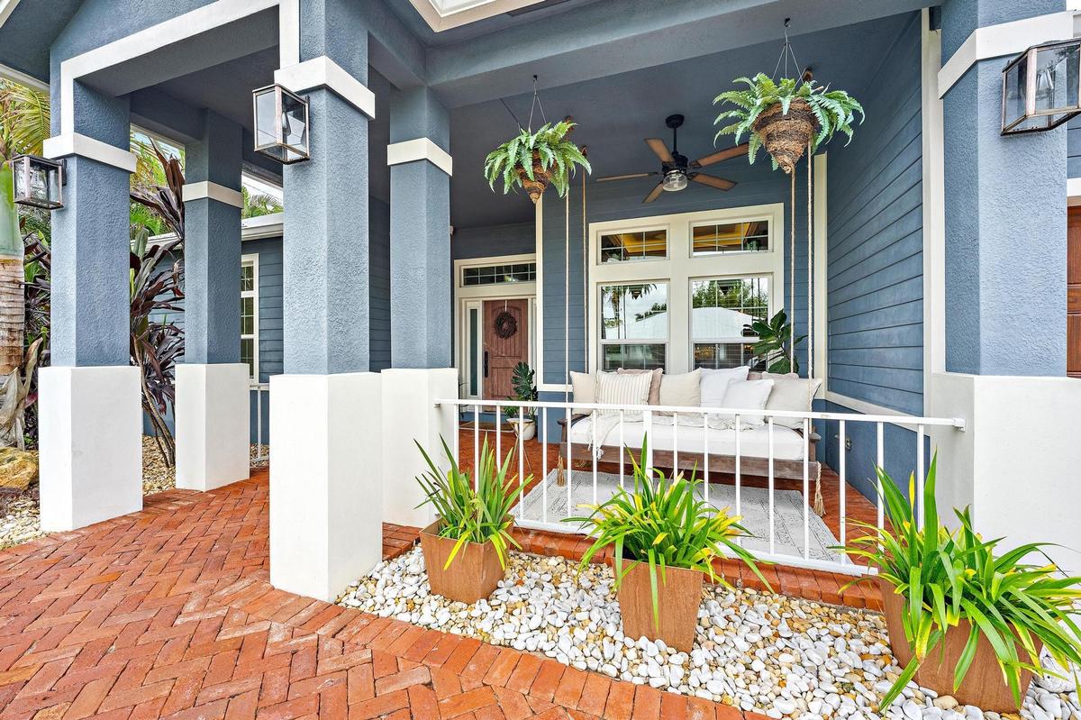 Enjoy your morning coffee and watch the sunrise from your charming front porch!