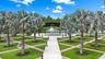 Welcome to the Patio at Palm City Place! a Newly Redesigned Community Park with open air Pavilion, Walking Path, Games, Lake and more! Enjoy Community