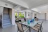 Interior staircase, Large Patio with dual dining, BBQ and access to water