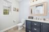Remodeled Powder Bath with Upgraded Cabinet & Mirror