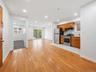 Hardwood flooring throughout the main living space
