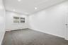 Recessed ceiling lighting, a window with security bars, and baseboard heating