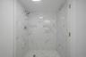 Bathroom with tiled shower