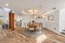 Dining with cove lighting and custom Millwork