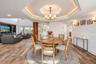 Dining with cove lighting and custom Millwork