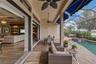 Lanai showing electric shades partially extended