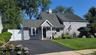 Lovely curb appeal with and  newly sealed driveway!
