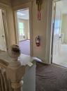 entry landing to apartment upstairs
