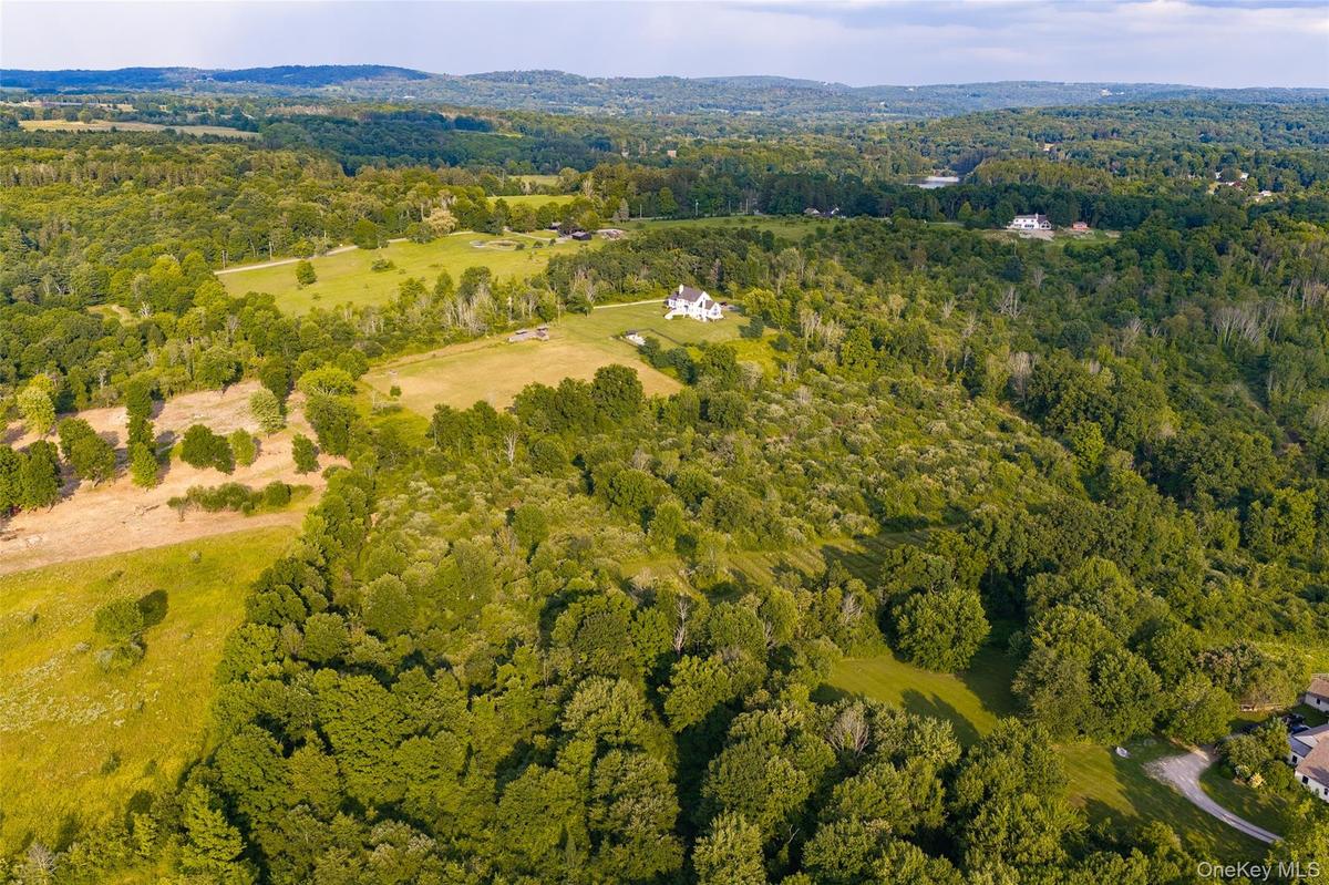 Property for sale is the lighter colored area in the middle of the photo.