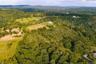 Property for sale is the lighter colored area in the middle of the photo.
