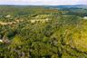 Property is in mid-screen.  Looking from westside, northwesterly, in northeast direction.