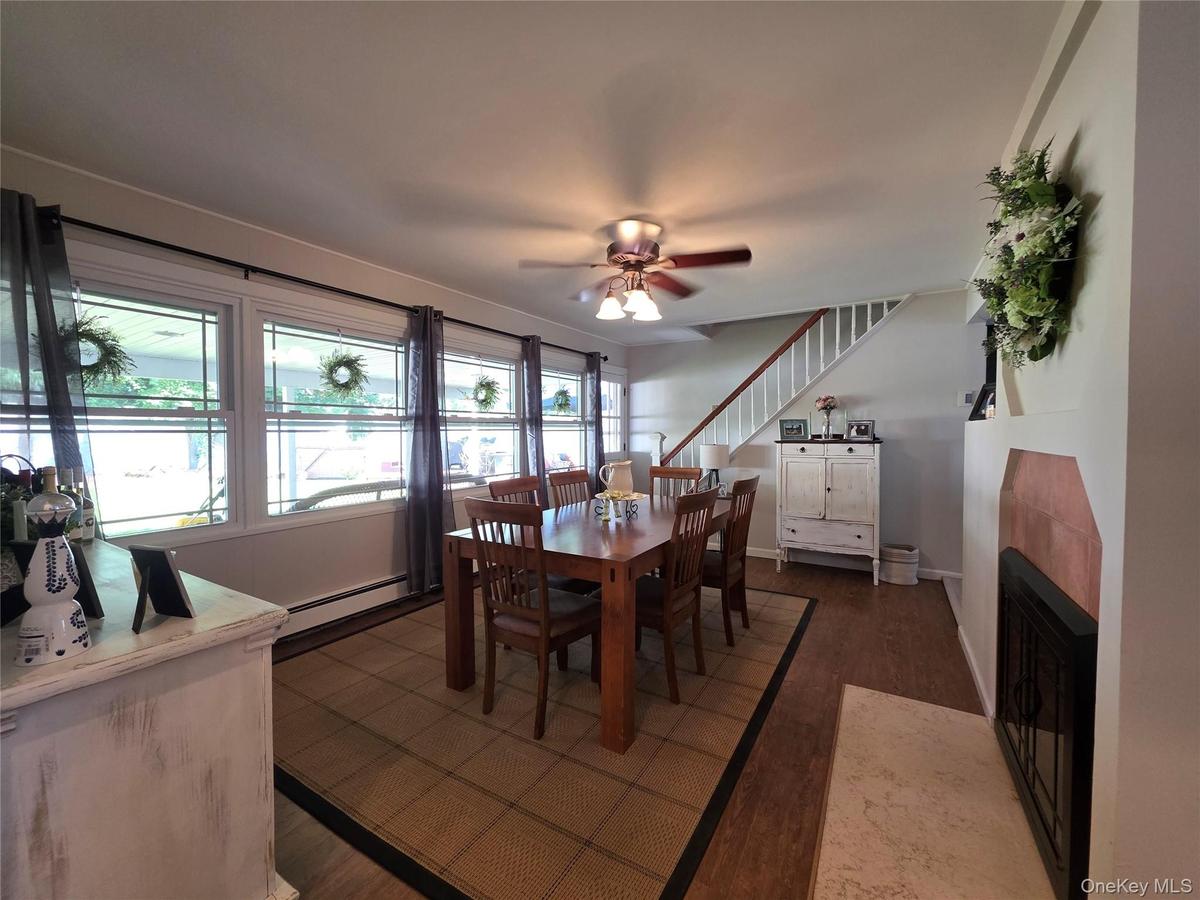 Dining Room with Wall of Windows overlooking the backyard.