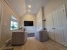 "Hearth Room" with Bay Window, Cathedral Ceiling, recessed lighting with plenty of storage in double door coat closet!