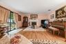 Oversized sliders and marble surround fireplace