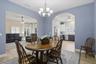 Formal dining room opens to family room