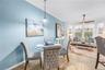 Open living and dining areas flow together comfortably, creating an inviting setting for everyday living and entertaining.