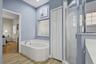 Separate garden tub and walk in shower
