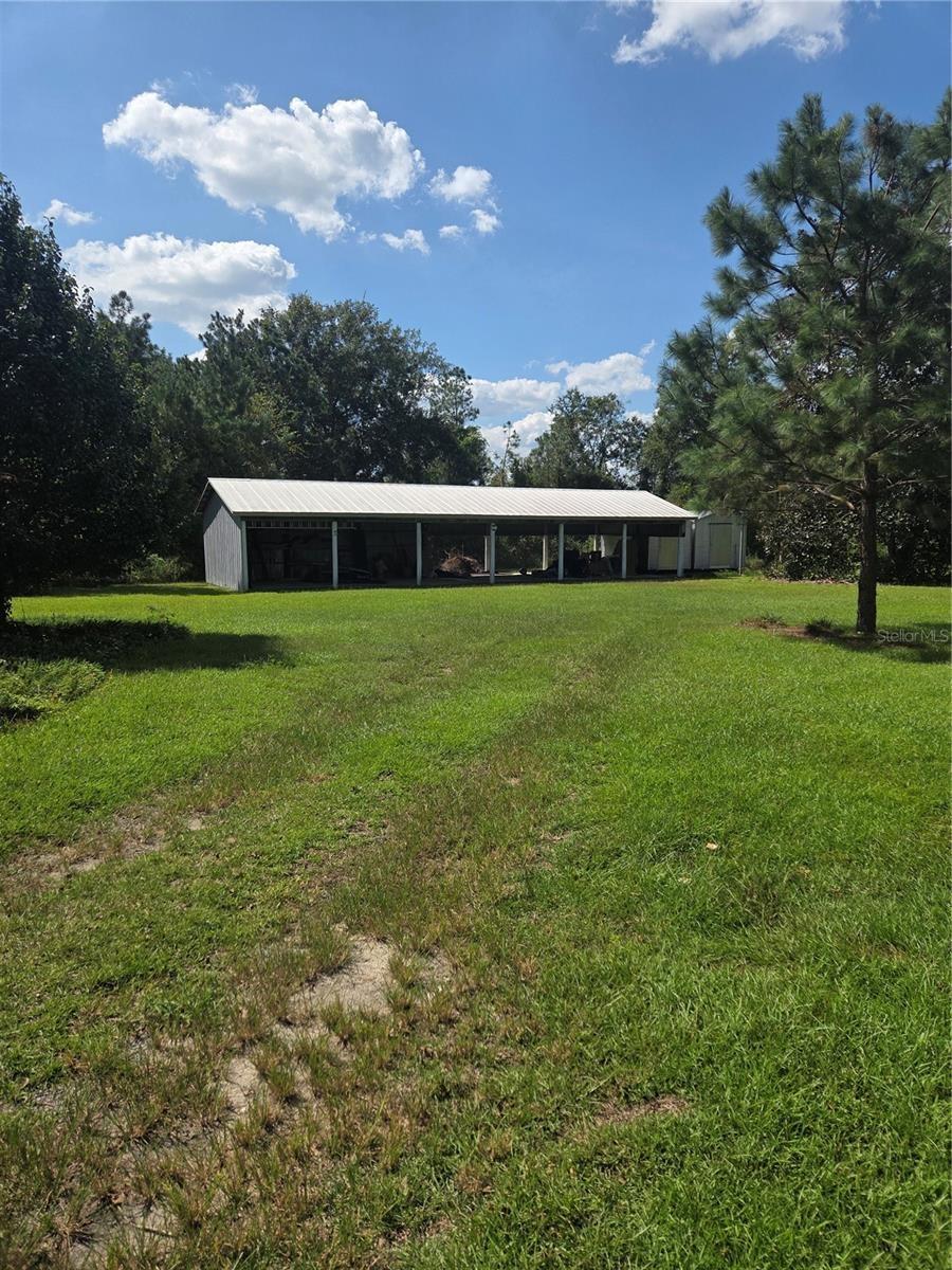 Rear of property 20x60 Carport, workshop etc.