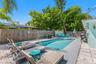 Your own private Florida retreat with a heated pool, lounging space, and a fully fenced yard.